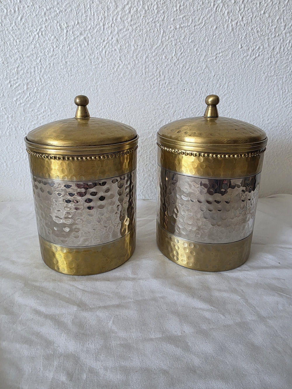 Pair of Vintage Hand Hammered Two Tone Brass and Silver Tone Canisters